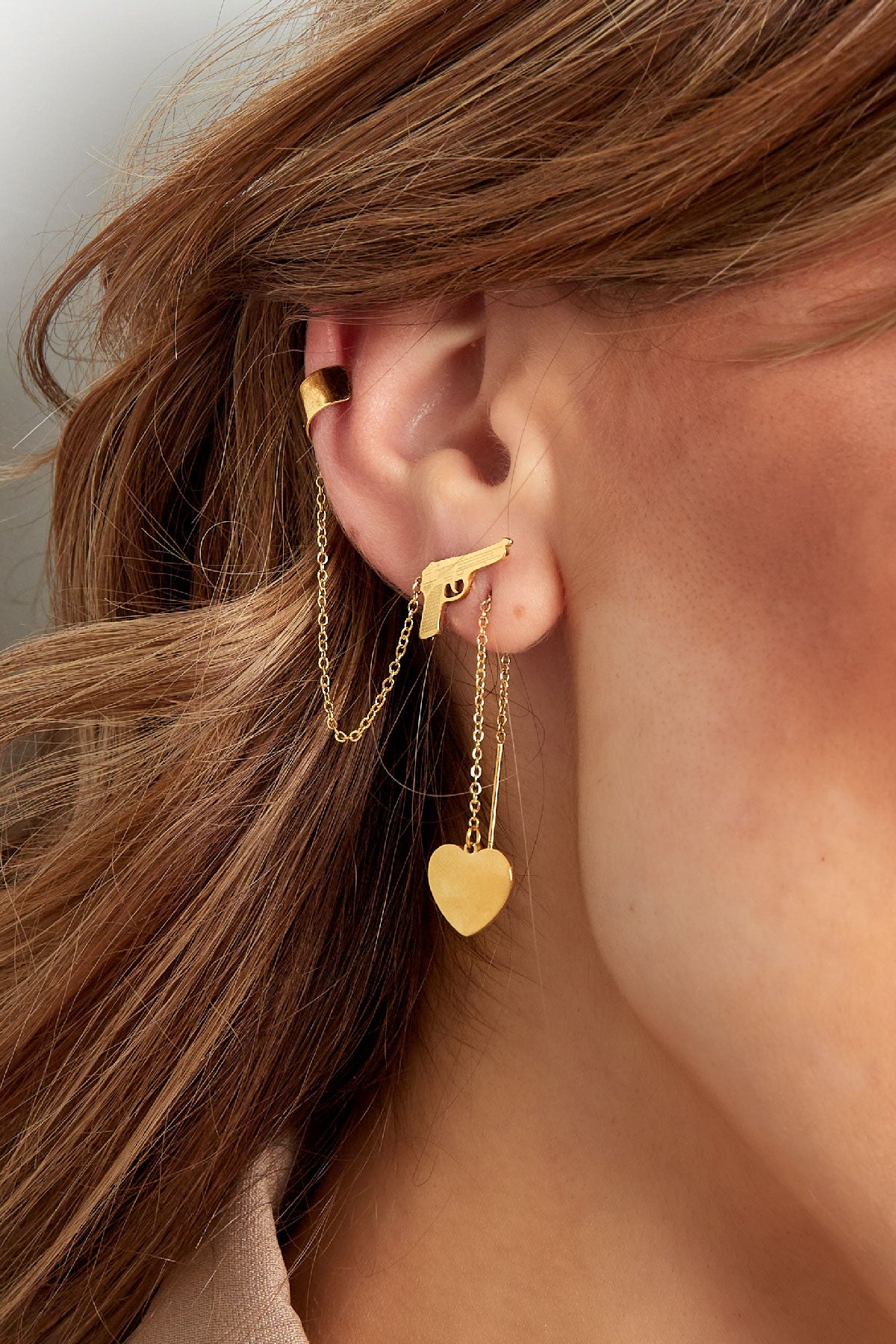 earrings gun with ear cuff