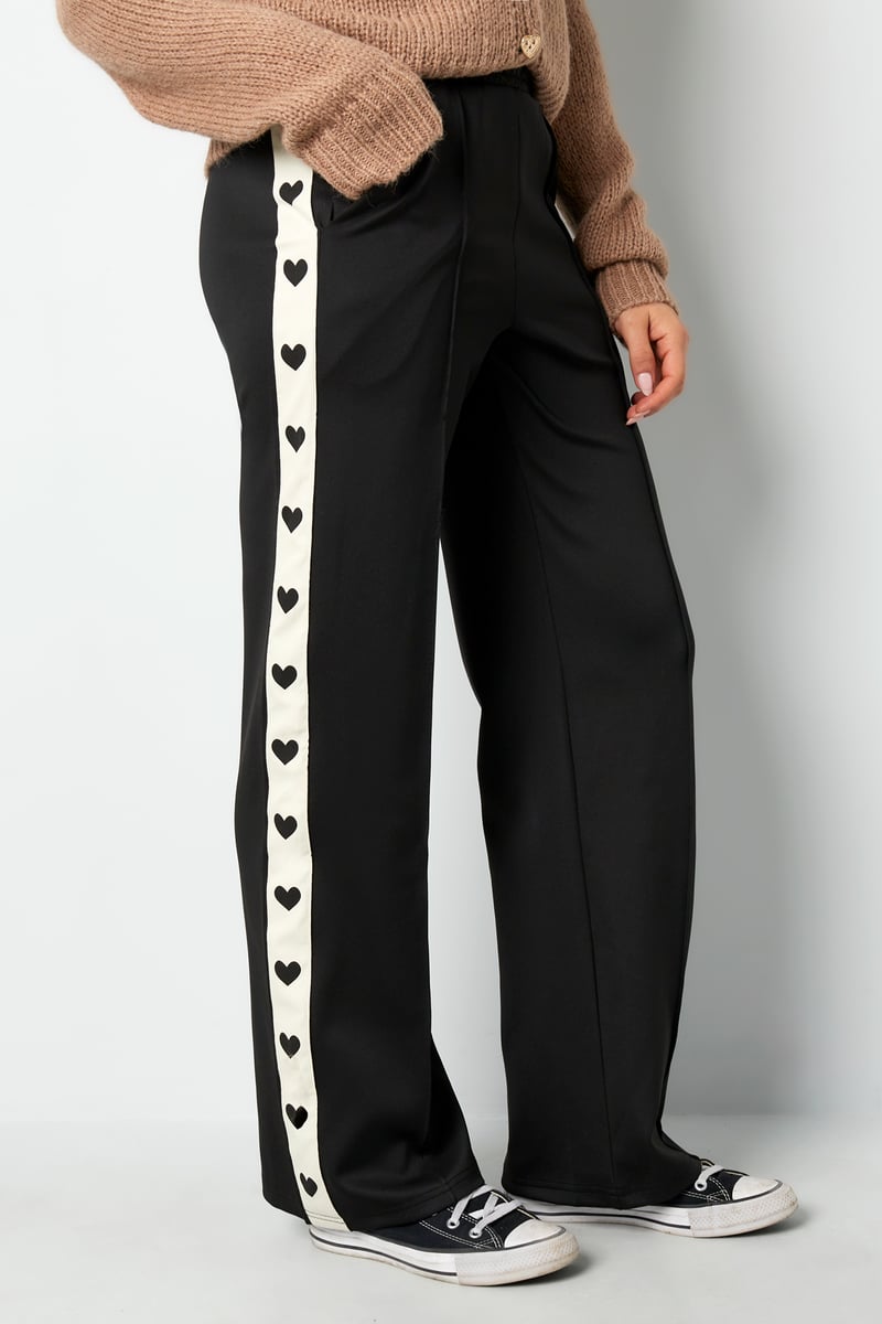 Pants with hearts on the side - red