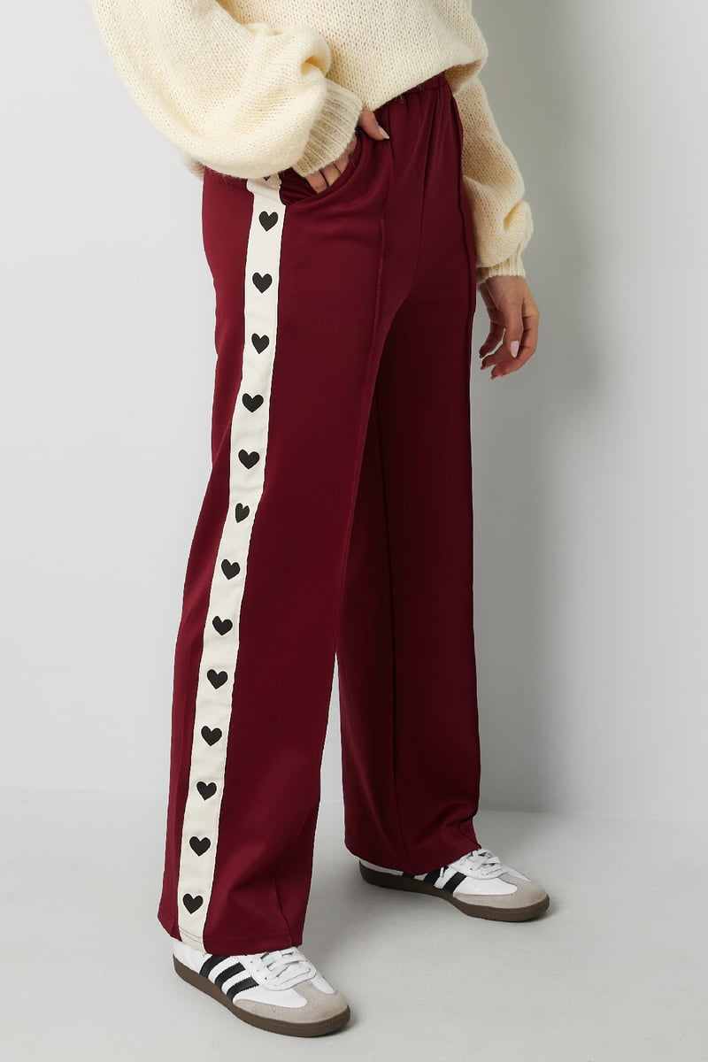 Pants with hearts on the side - red